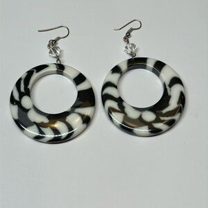 Larger retro acrylic dangle flamenco hoops black and white swirl